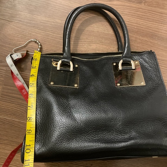 Danier Sage" metal black leather satchel with gold trimmings - Picture 15 of 16